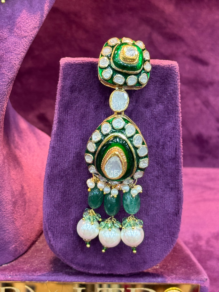 Decorative Polki earrings on a purple stand with a purple background "SP. Jewellry"