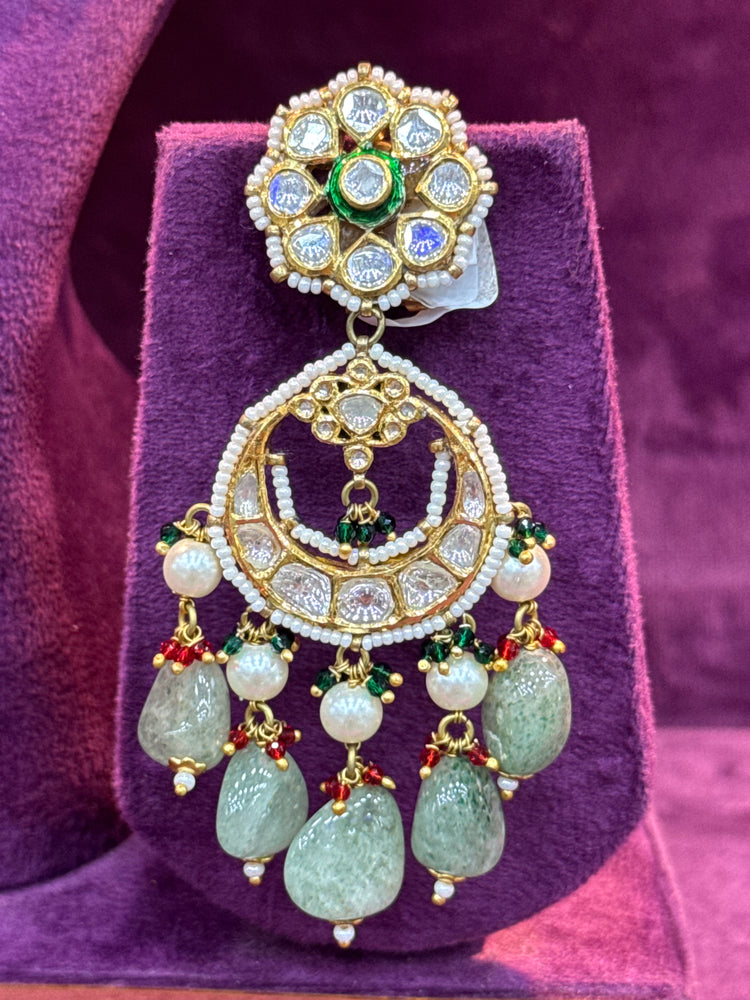 polki earrings with gemstones and pearls on a purple velvet background "SP. Jewellers"